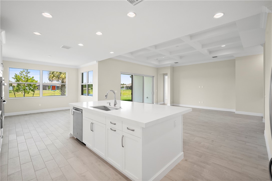 6344 High Pointe Circle Vero Beach, FL 32967 - Photo 6 of 26 a large white room with a window