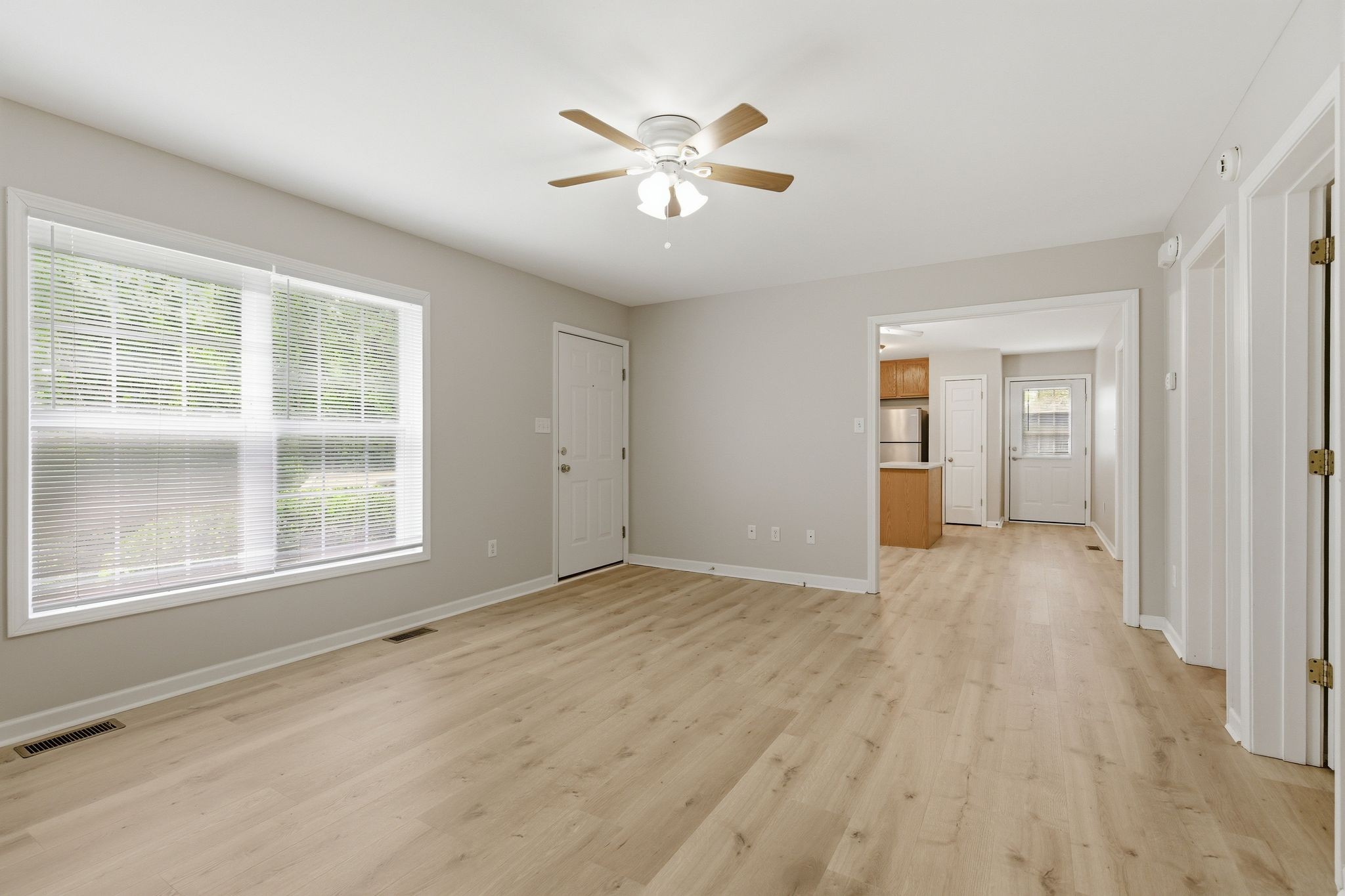 2642 Hibbitts Road Nashville, TN 37214 - Photo 10 of 29 wooden floor in an empty room with a window