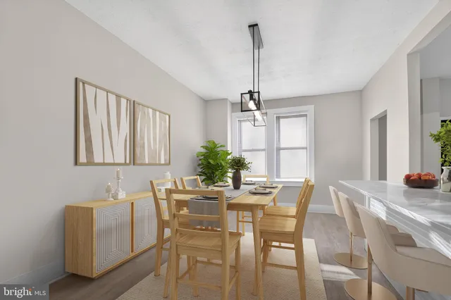 a view of a livingroom with furniture and window