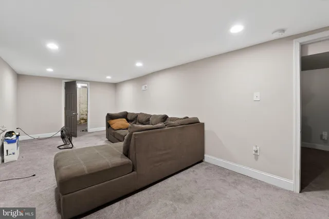 a living room with furniture and a couch