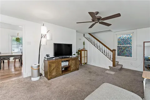 a view of livingroom with furniture and a flat screen tv