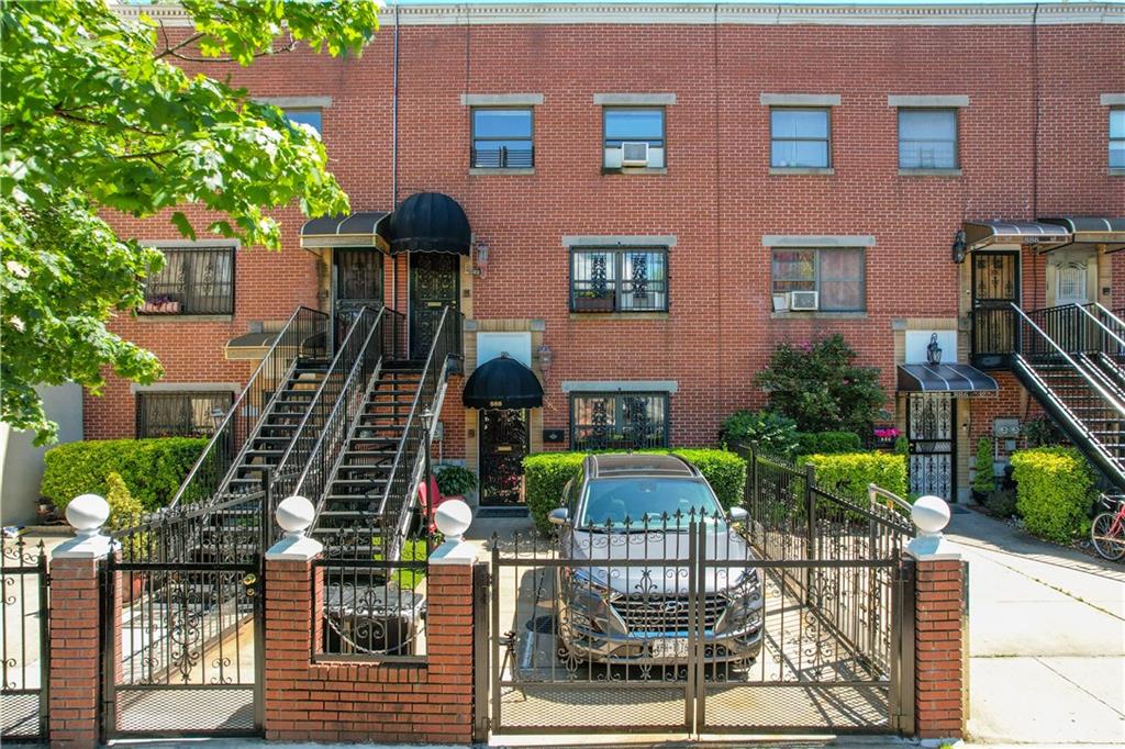 888 Gates Avenue Brooklyn, NY 11221 - Photo 12 of 18 a front view of house and yard with green space