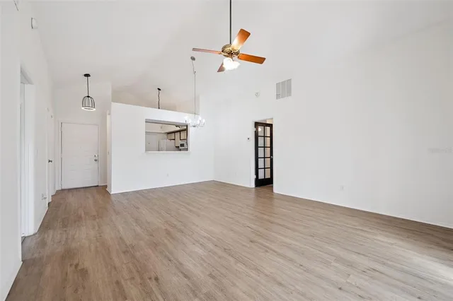 a view of a livingroom with wooden floor