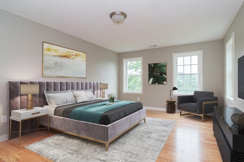 41 Martin Road Douglas, MA 01516 - Photo 22 of 32 a bedroom with a bed and glass window