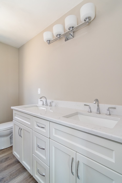 41 Martin Road Douglas, MA 01516 - Photo 25 of 32 a bathroom with a sink and a mirror