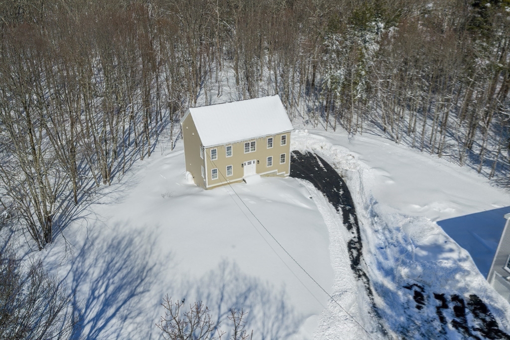 41 Martin Road Douglas, MA 01516 - Photo 32 of 32 a view of a backyard with wooden fence