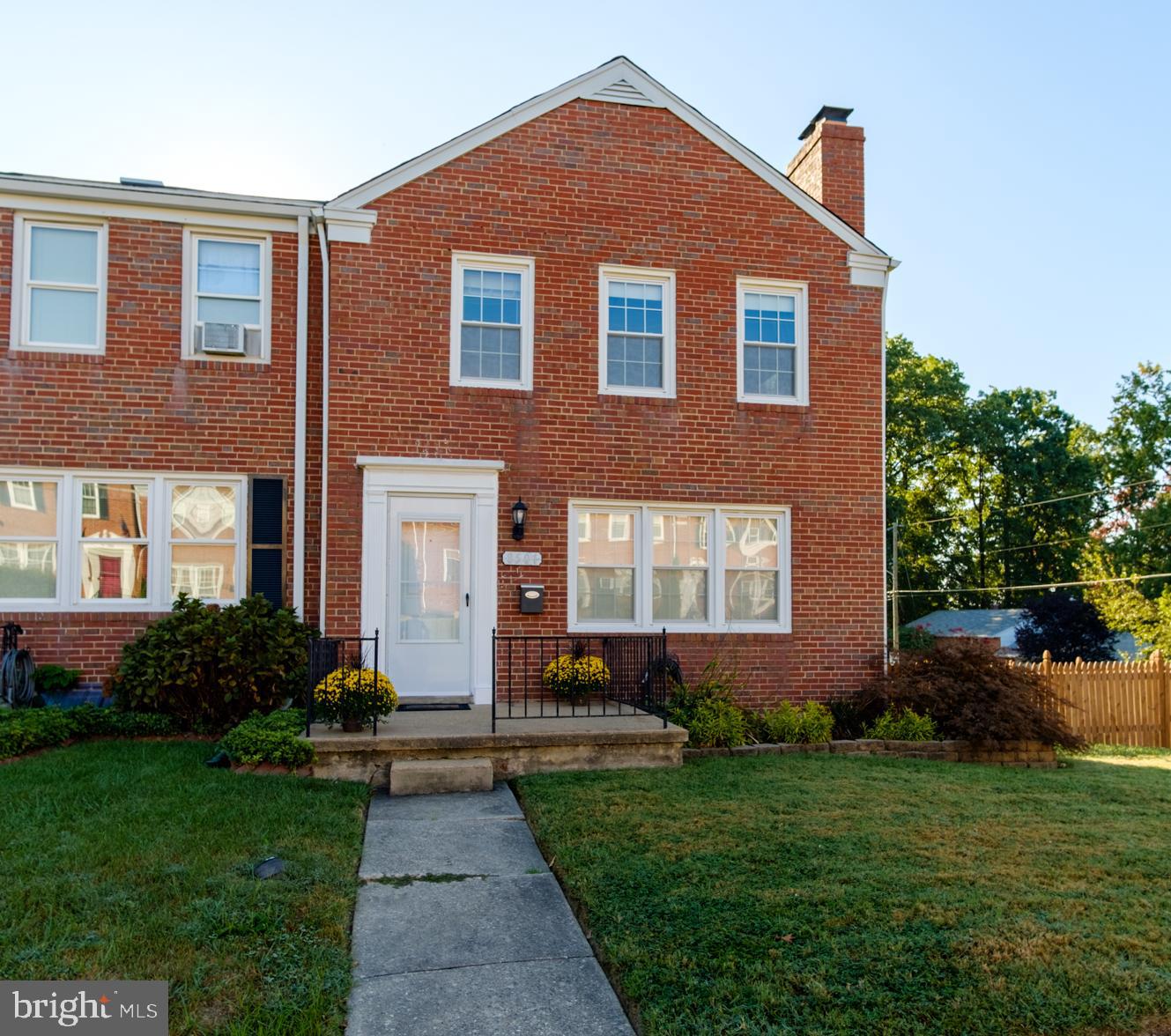 8501 Pleasant Plains Road Baltimore, MD 21286 - Photo 2 of 53 a front view of a house with garden