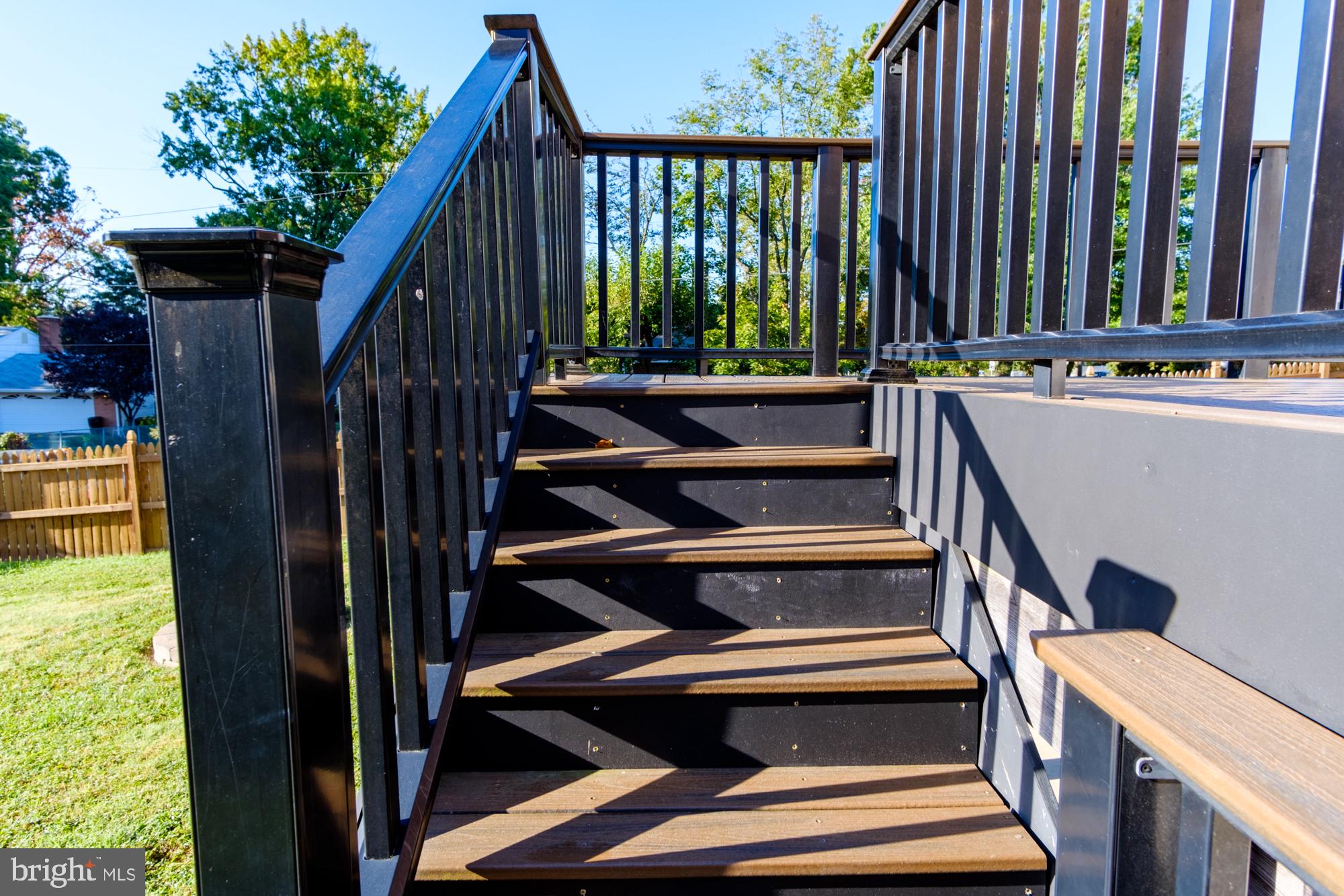 8501 Pleasant Plains Road Baltimore, MD 21286 - Photo 14 of 53 a view of balcony with wooden floor and fence