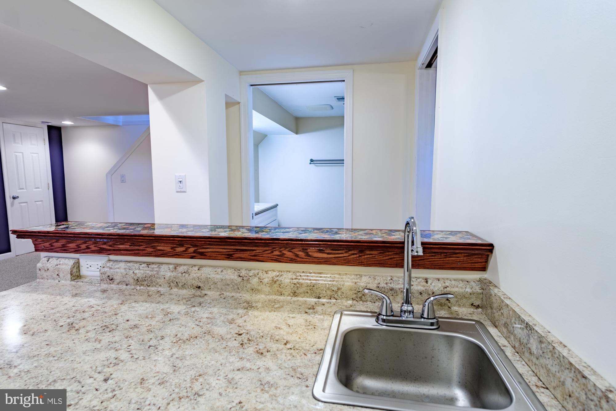 8501 Pleasant Plains Road Baltimore, MD 21286 - Photo 36 of 53 a bathroom with a sink and a mirror
