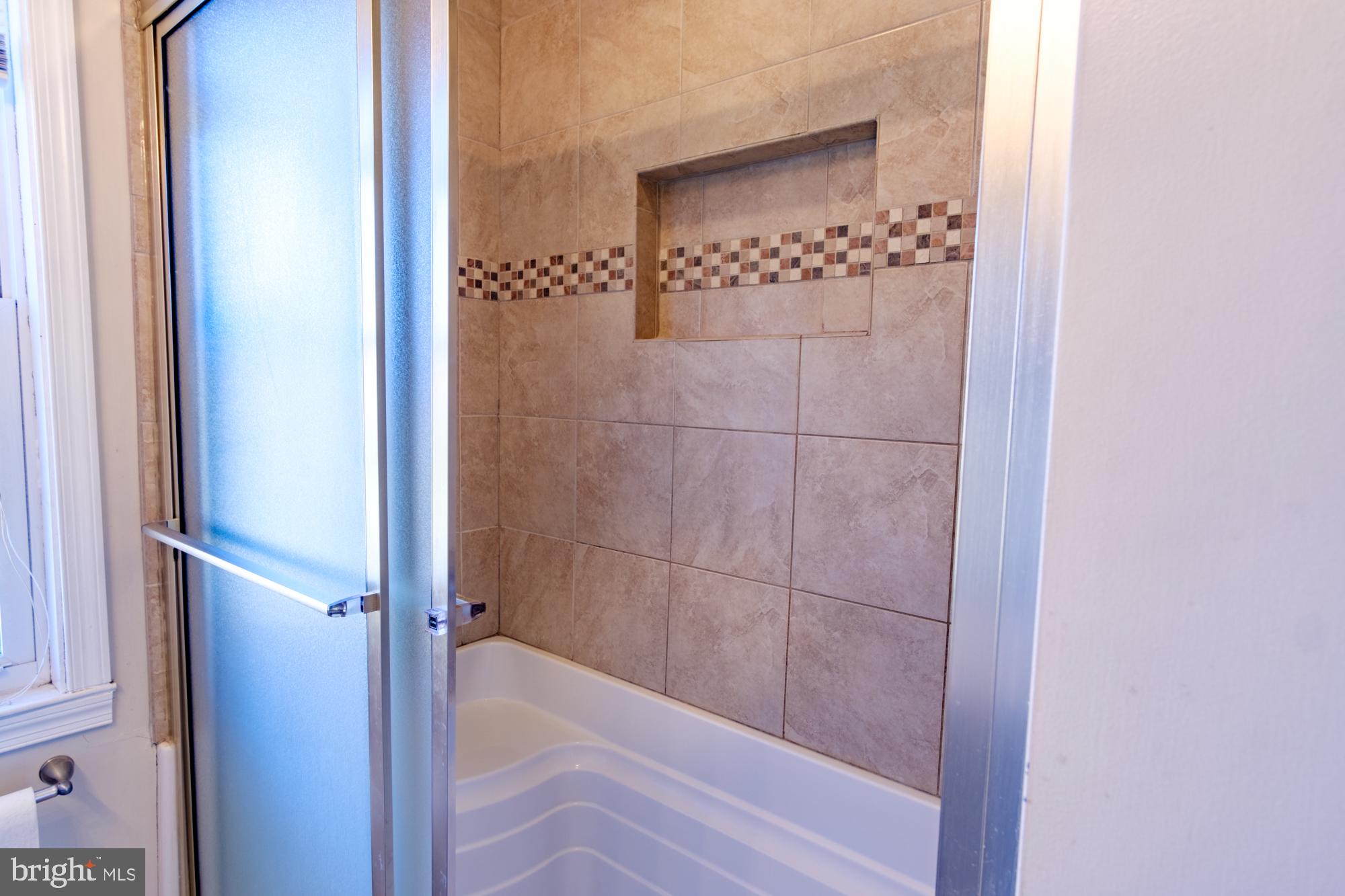 8501 Pleasant Plains Road Baltimore, MD 21286 - Photo 44 of 53 a bathroom with a bathtub