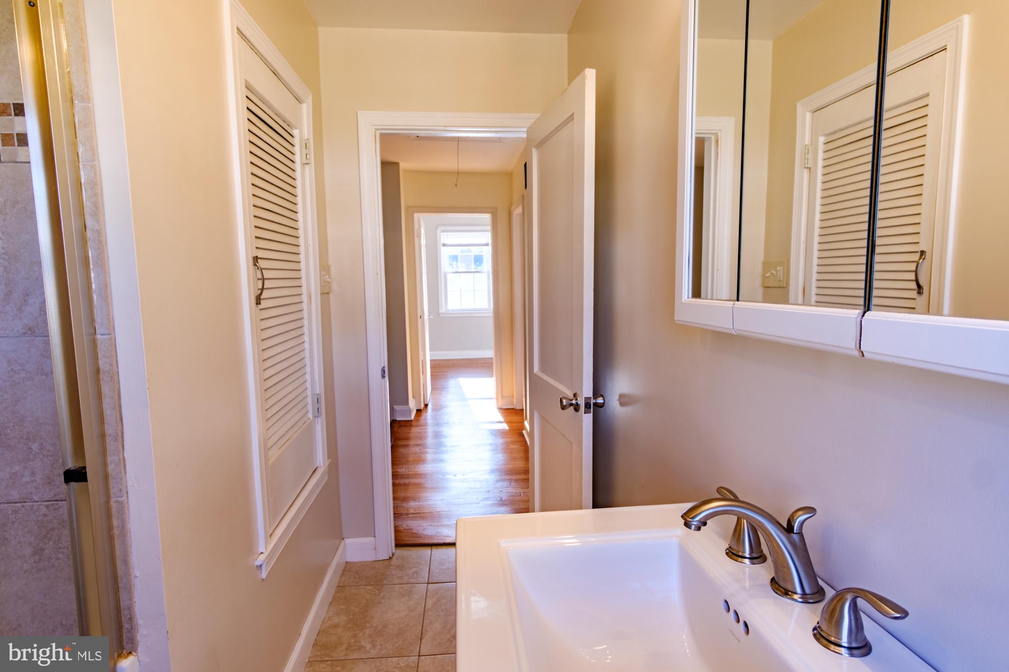 8501 Pleasant Plains Road Baltimore, MD 21286 - Photo 45 of 53 a bedroom with a bed and a window