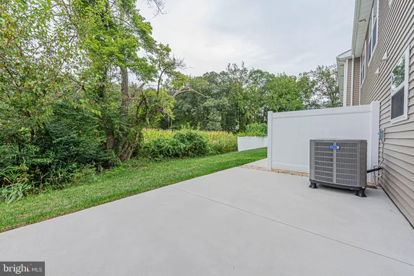 a view of swimming pool in front of house