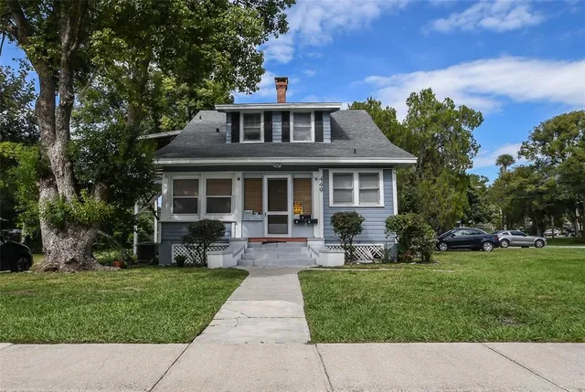 front view of a house with a yard