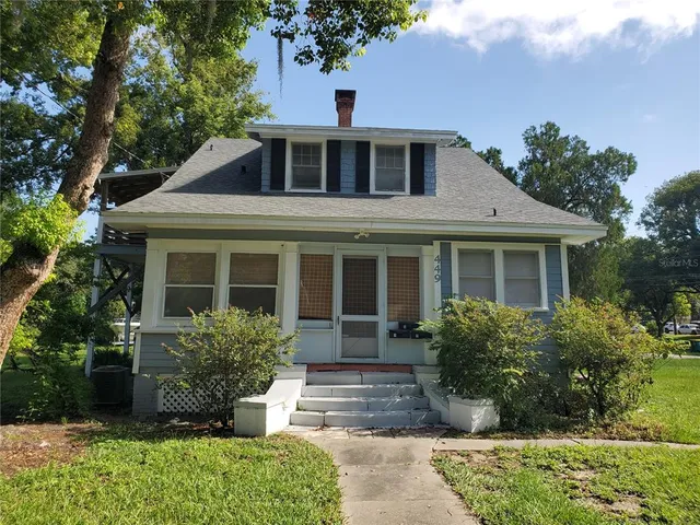 an aerial view of a city with lots of residential buildings