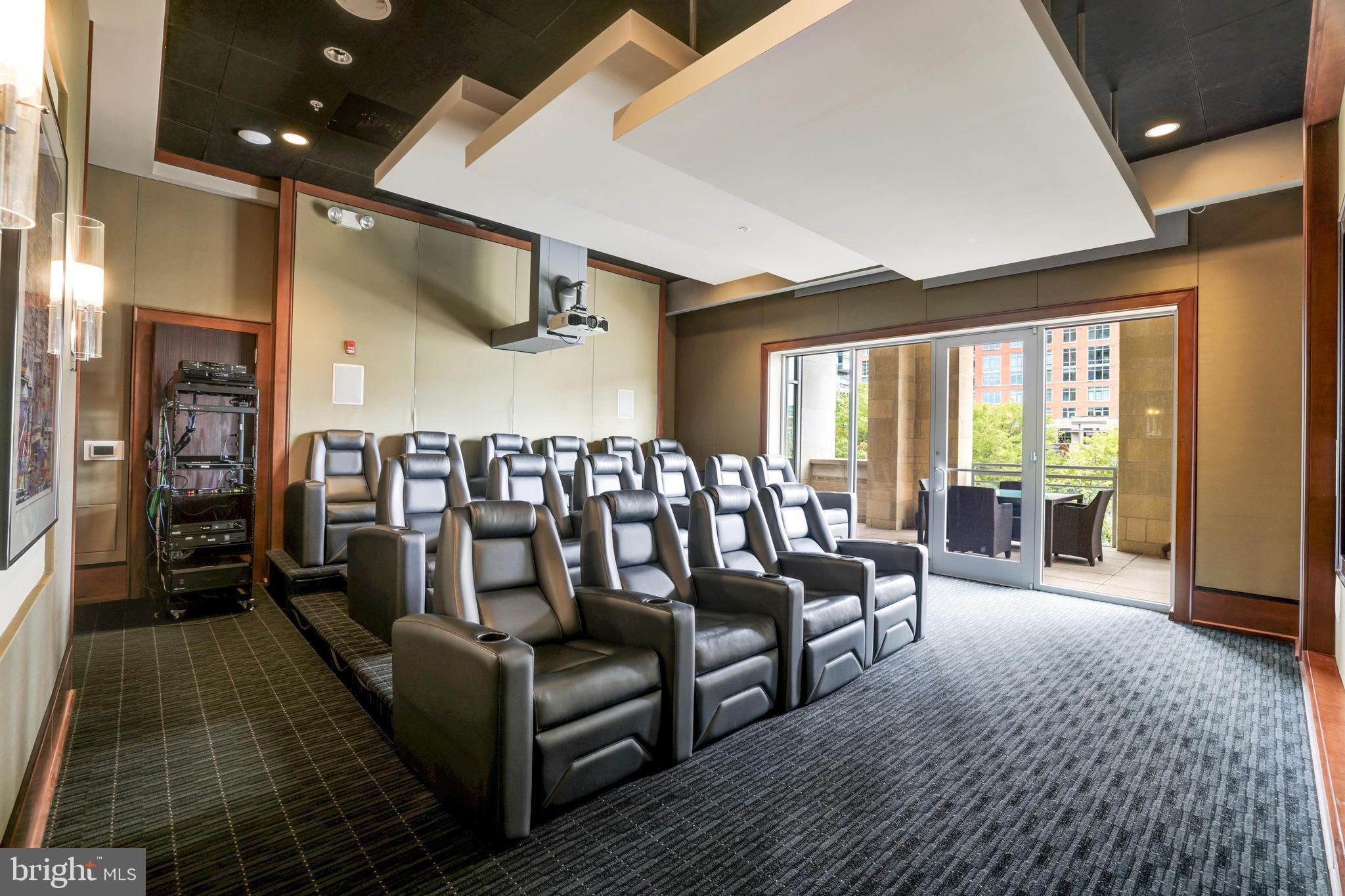 11990 Market Street, Unit 414 Reston, VA 20190 - Photo 44 of 52 a living room with furniture and a large window