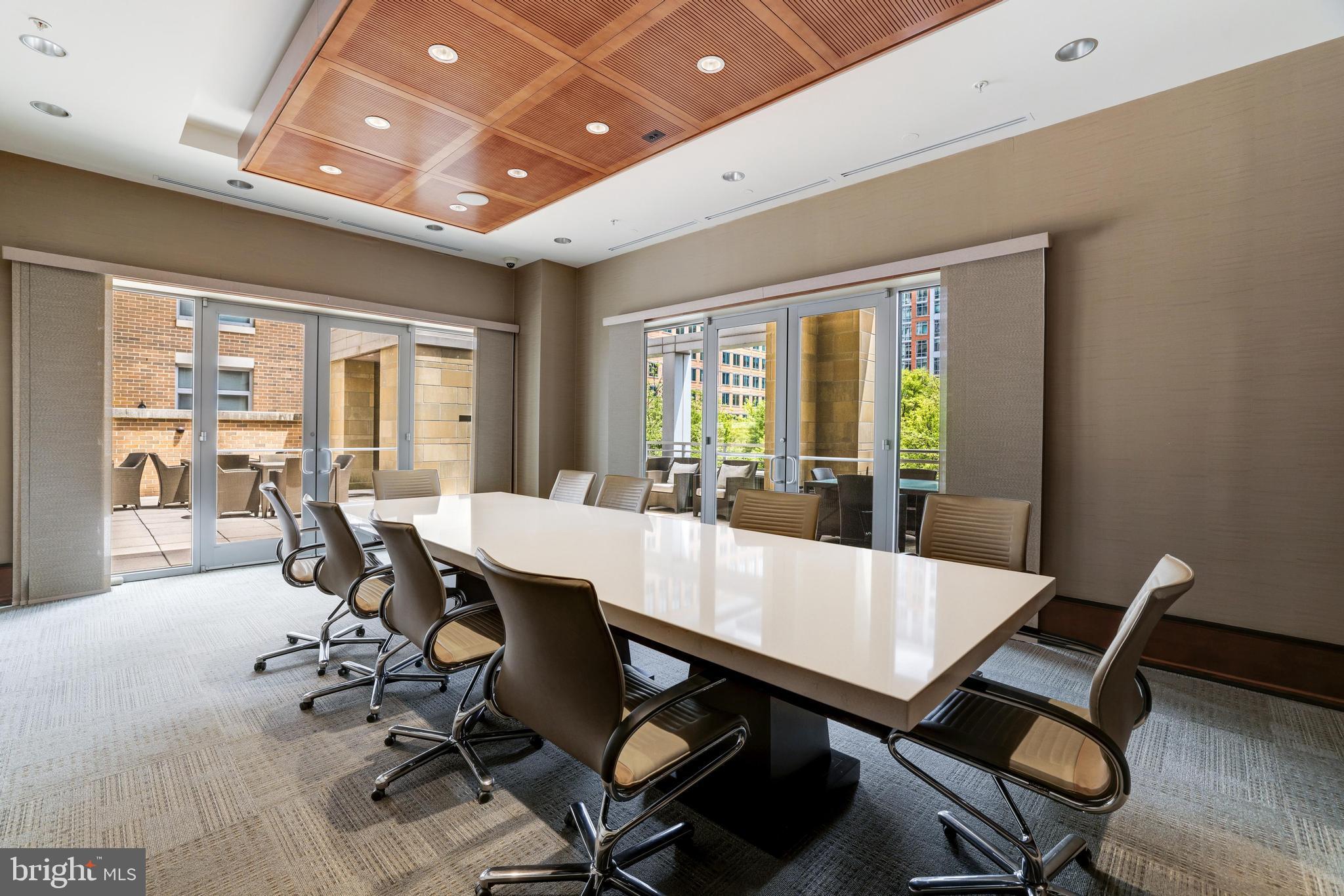 11990 Market Street, Unit 414 Reston, VA 20190 - Photo 47 of 52 a view of a dining room with furniture window and outside view