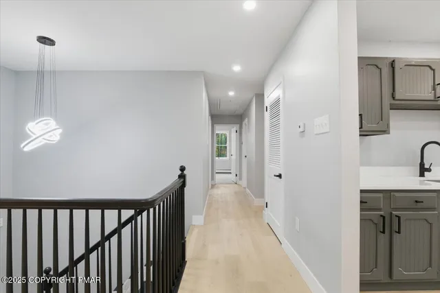 a view of an empty room with fireplace
