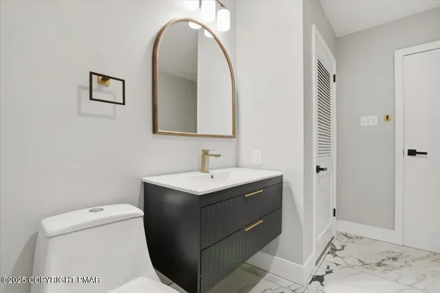 a front view of a house with glass windows