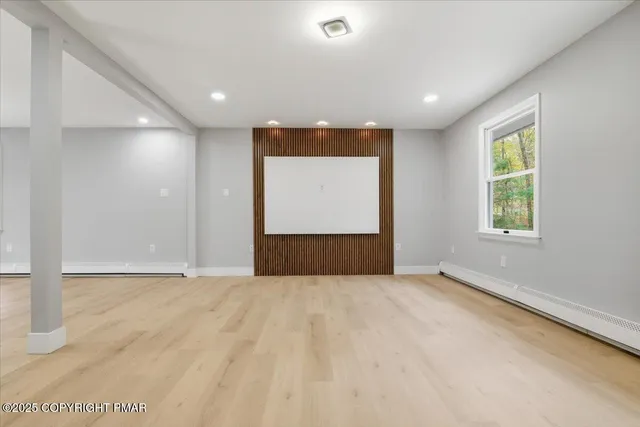 a view of a hallway with windows