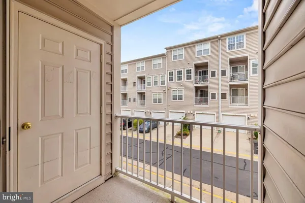 a view of a large building with a balcony