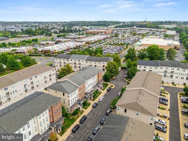 an aerial view of a city with lots of residential buildings