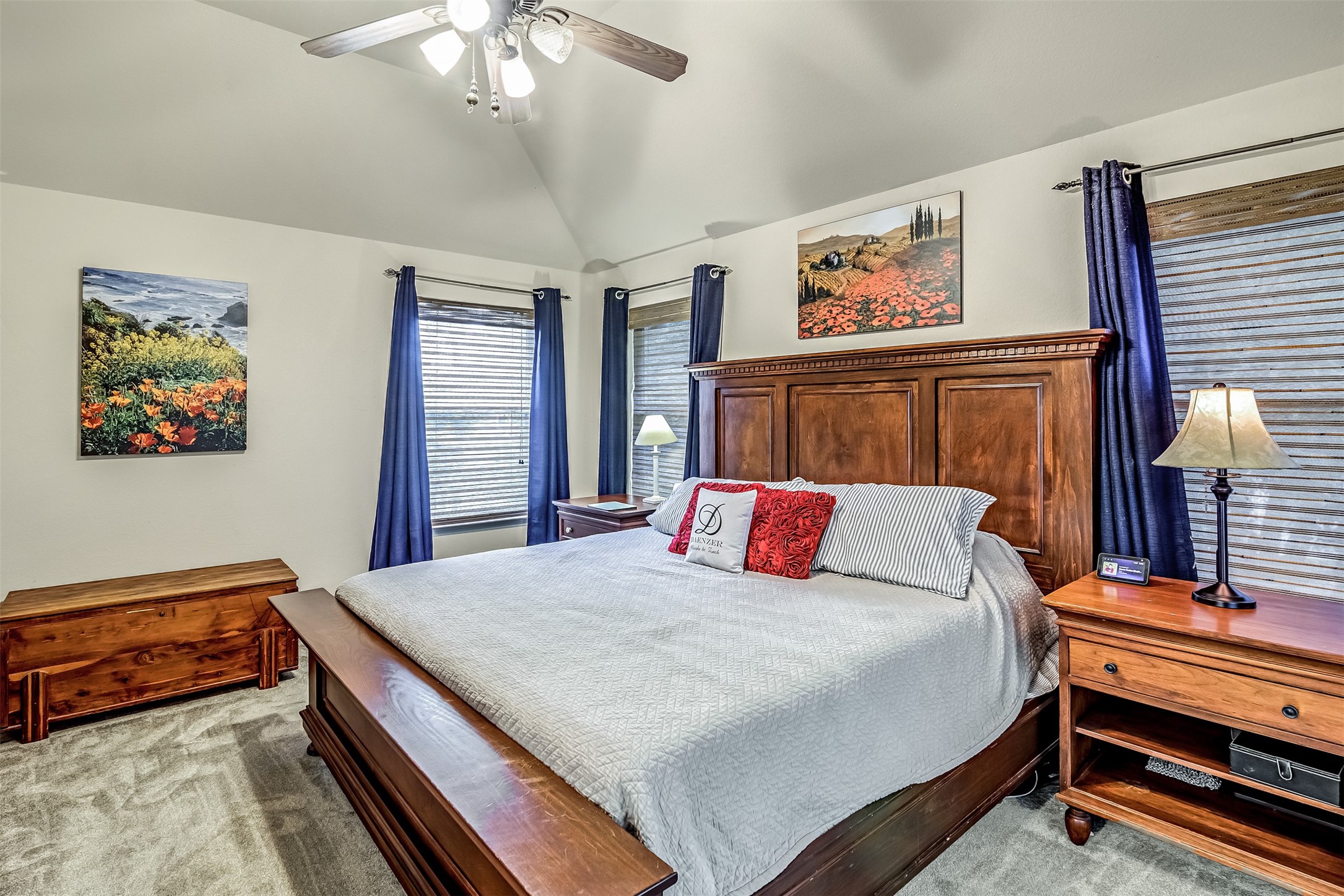 19303 Young Oak Street Spring, TX 77379 - Photo 14 of 29 The primary bedroom features carpet, ceiling fan and picture windows.