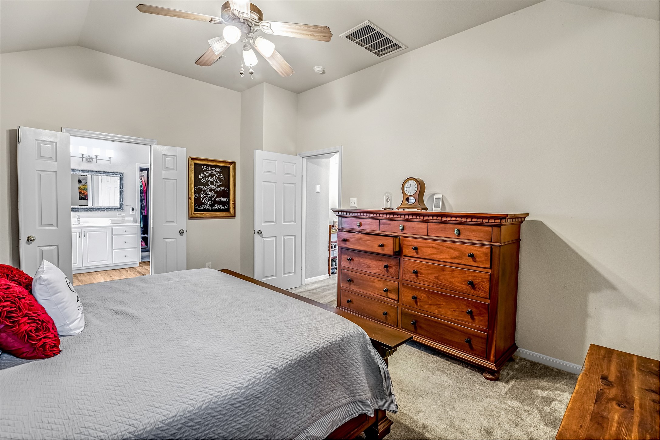 19303 Young Oak Street Spring, TX 77379 - Photo 15 of 29 Another view of the primary bedroom with double door entry to updated en-suite.
