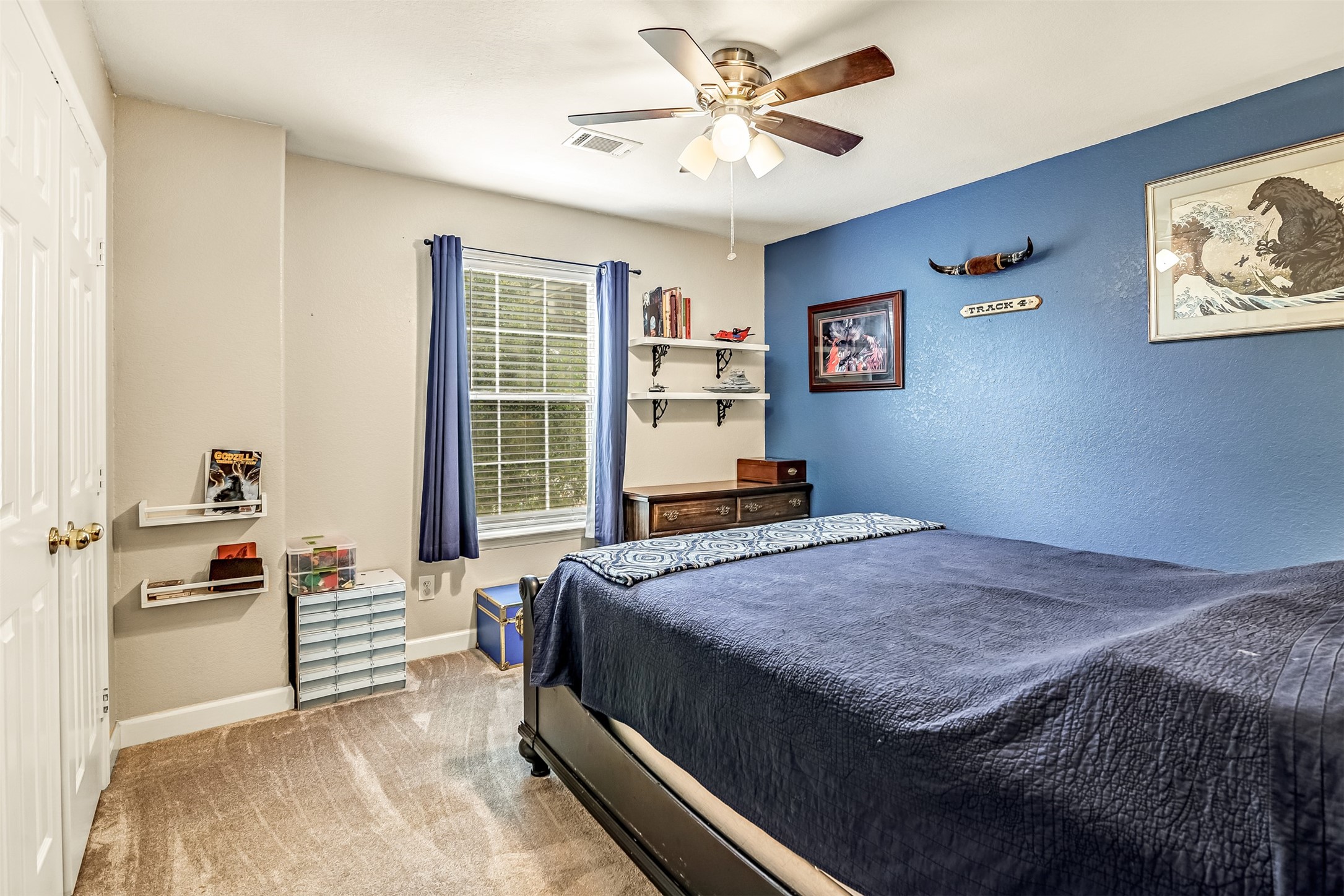 19303 Young Oak Street Spring, TX 77379 - Photo 19 of 29 Another secondary bedroom with carpet, ceiling fan and picture window.