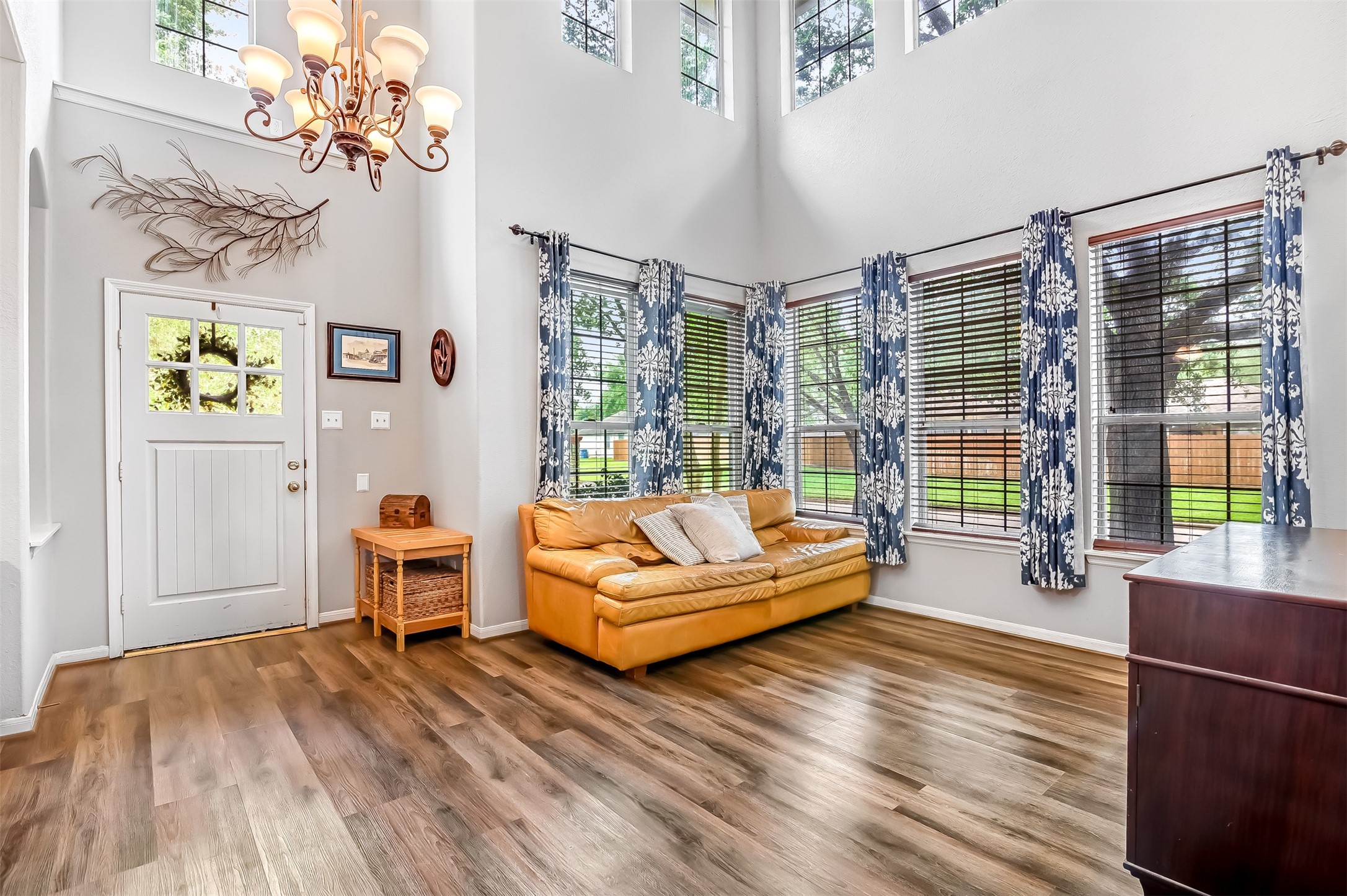 19303 Young Oak Street Spring, TX 77379 - Photo 5 of 29 This room just off the front entry can be used as a dining room or extra living room space. The two story ceilings with two story windows allow for an abundance of natural light.