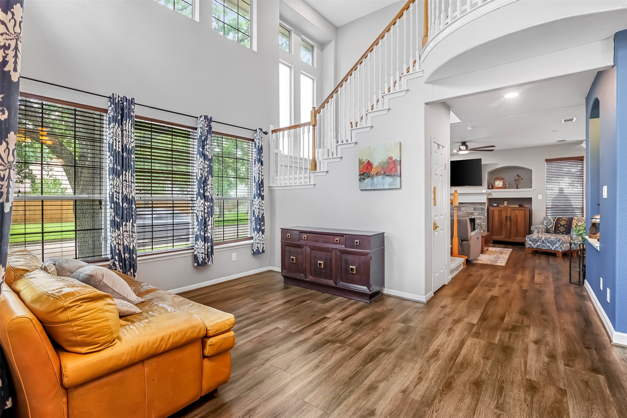 19303 Young Oak Street Spring, TX 77379 - Photo 6 of 29 Another view from the front entry showcasing the open concept living in this home. The downstairs main living areas all have matching luxury vinyl plank for a seamless flow.