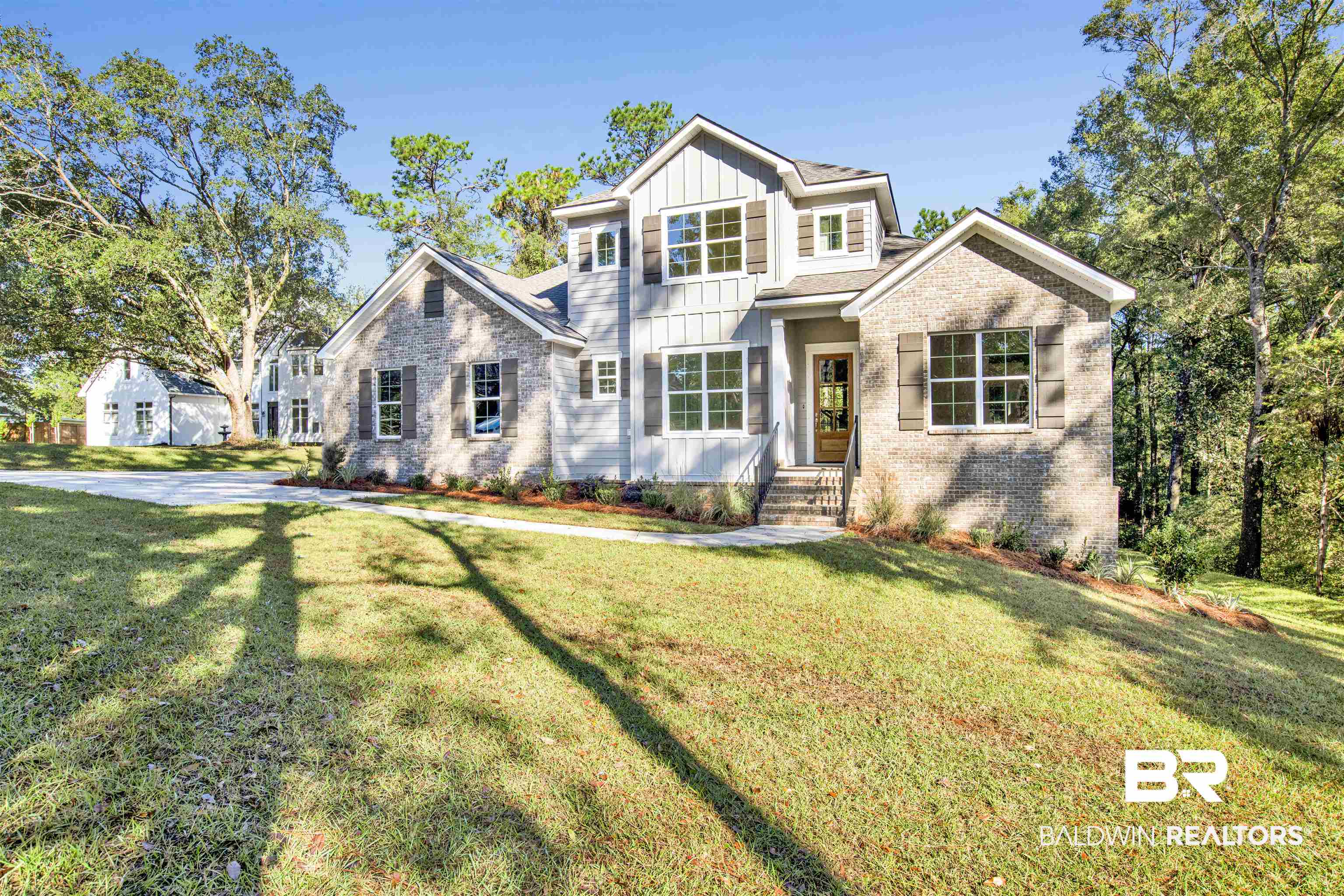 5 Long Leaf Circle Fairhope, AL 36532 - Photo 3 of 44 Craftsman house featuring a front lawn