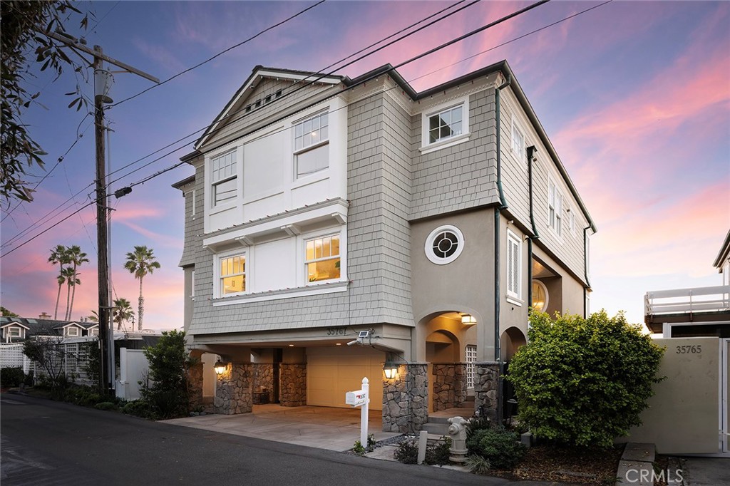 35767 Beach Road Dana Point, CA 92624 - Photo 50 of 50 a front view of a house with parking