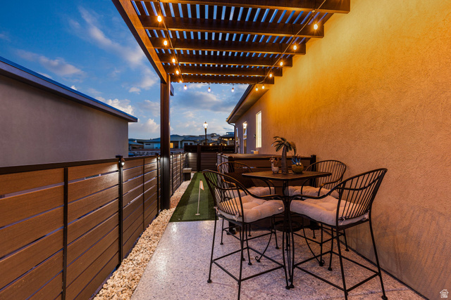 3022 West Sesia Way St. George, UT 84770 - Photo 4 of 52 Balcony with outdoor dining area and a putting area
