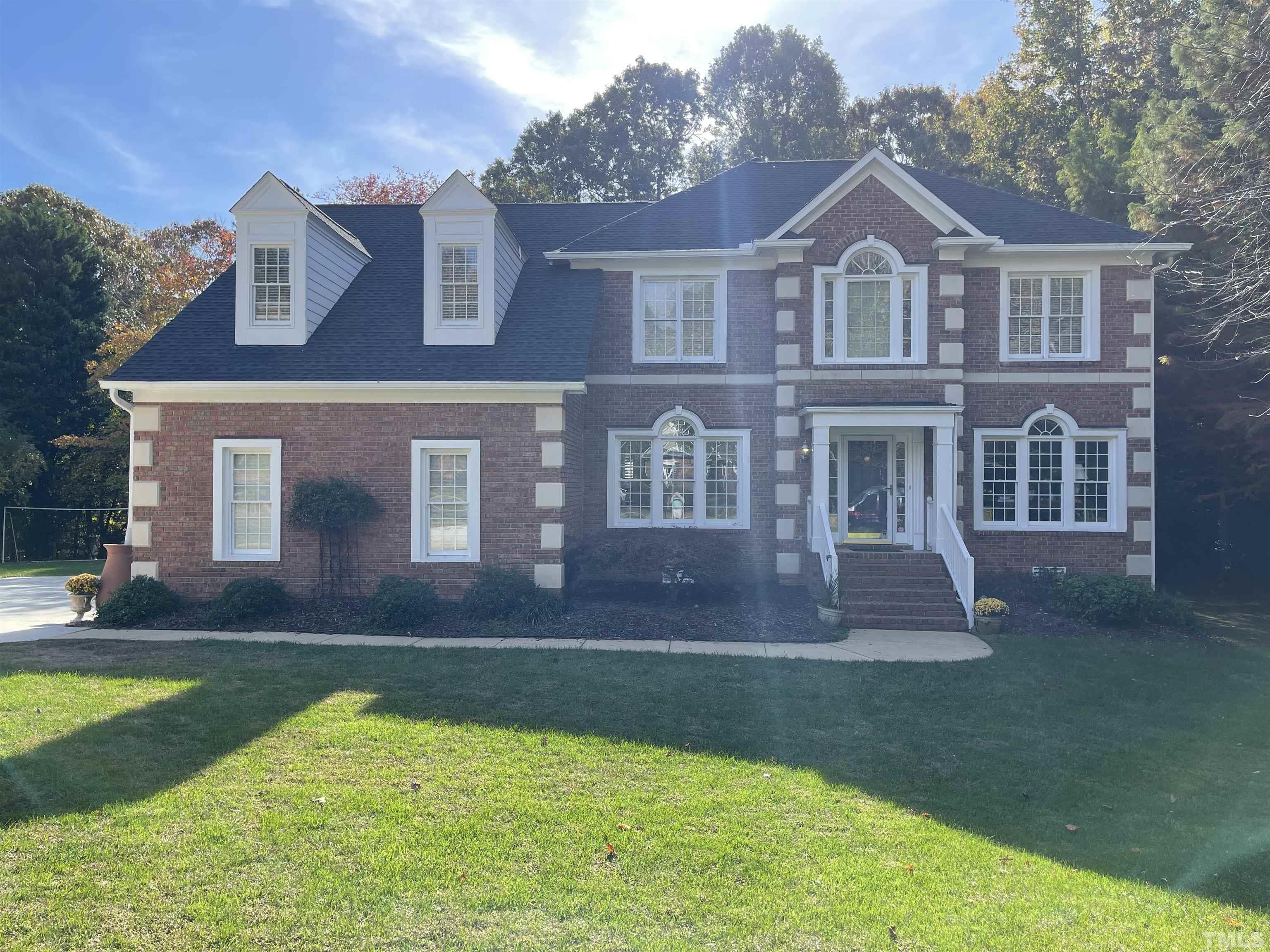 1508 October Road Raleigh, NC 27614 - Photo 1 of 30 front view of a house with a yard