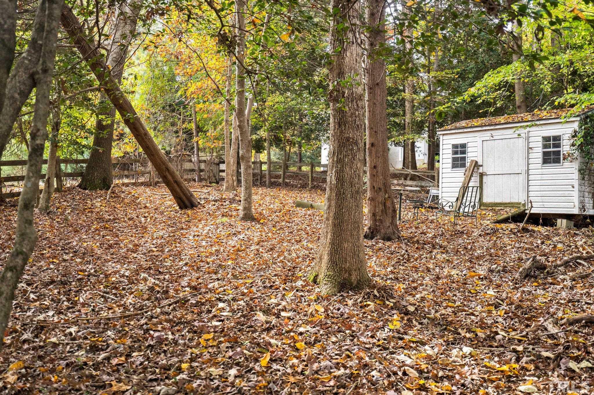 1508 October Road Raleigh, NC 27614 - Photo 28 of 30 a view of a backyard of the house