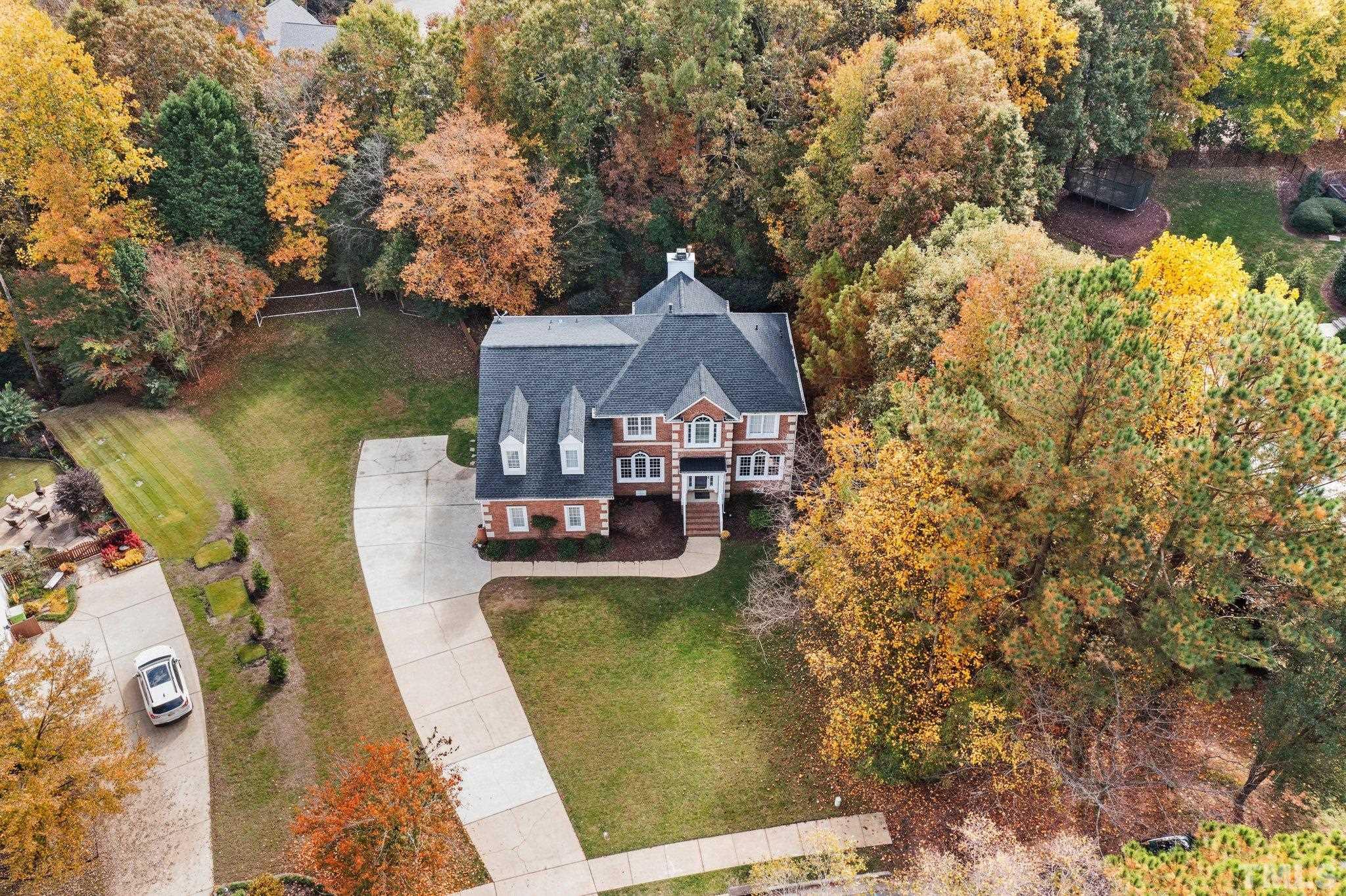 1508 October Road Raleigh, NC 27614 - Photo 4 of 30 a view of a house with pool and chairs