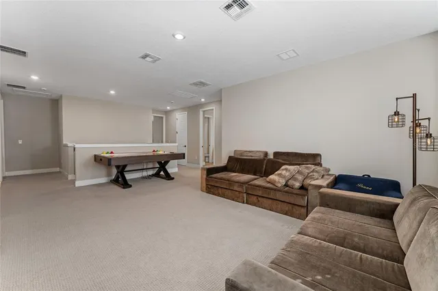 a living room with furniture and a couch