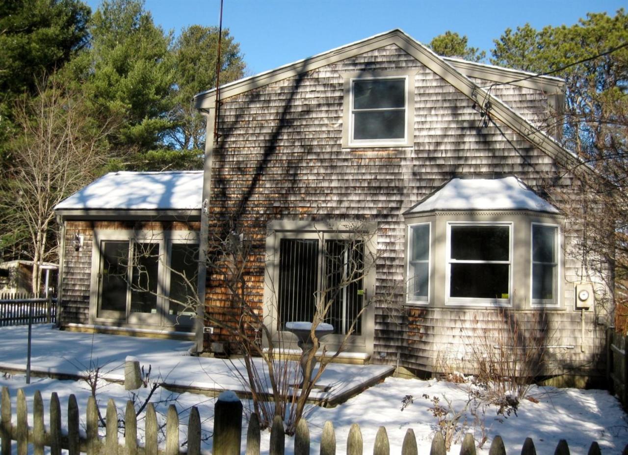 528 County Road Pocasset, MA 02559 - Photo 3 of 29 a front view of a house with yard