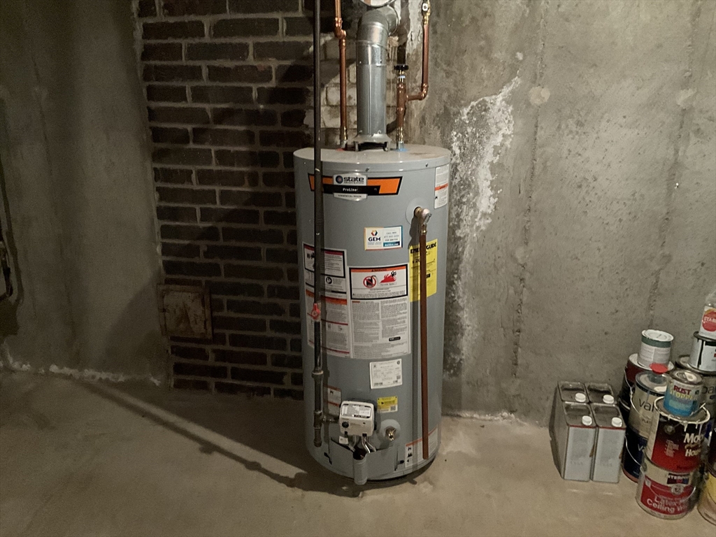 93 Plain Street Mansfield, MA 02048 - Photo 16 of 20 a close view of water heater room