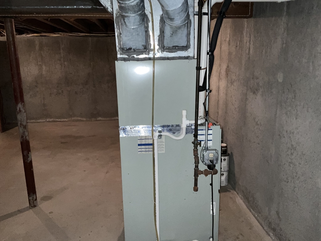 93 Plain Street Mansfield, MA 02048 - Photo 18 of 20 a close view of water heater room