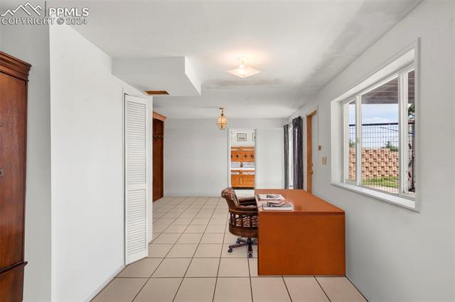 8155 Soap Weed Road Calhan, CO 80808 - Photo 24 of 39 Office space featuring light tile patterned flooring