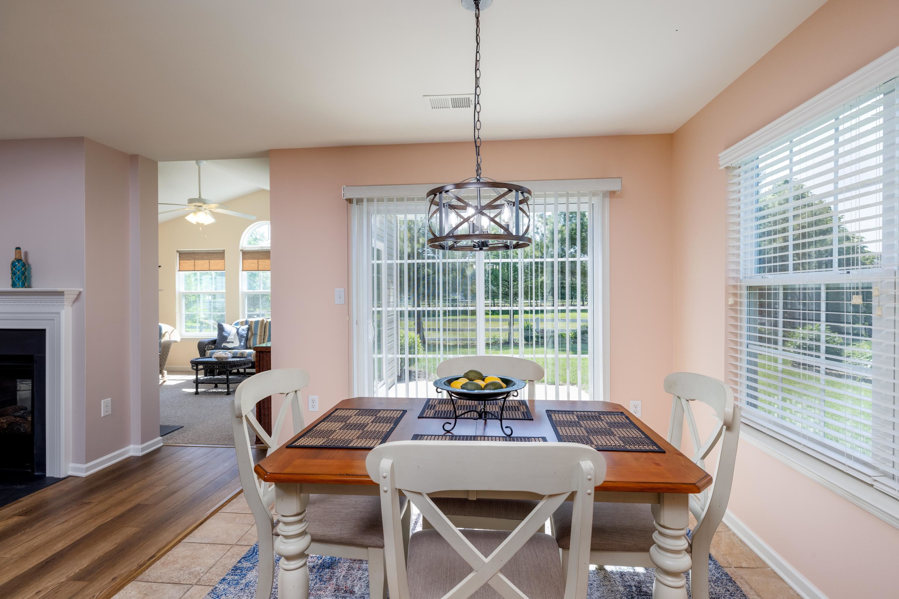 321 Aberdeen Way Rio Grande, NJ 08242 - Photo 16 of 32 a view of a dining room with furniture wooden floor and a chandelier