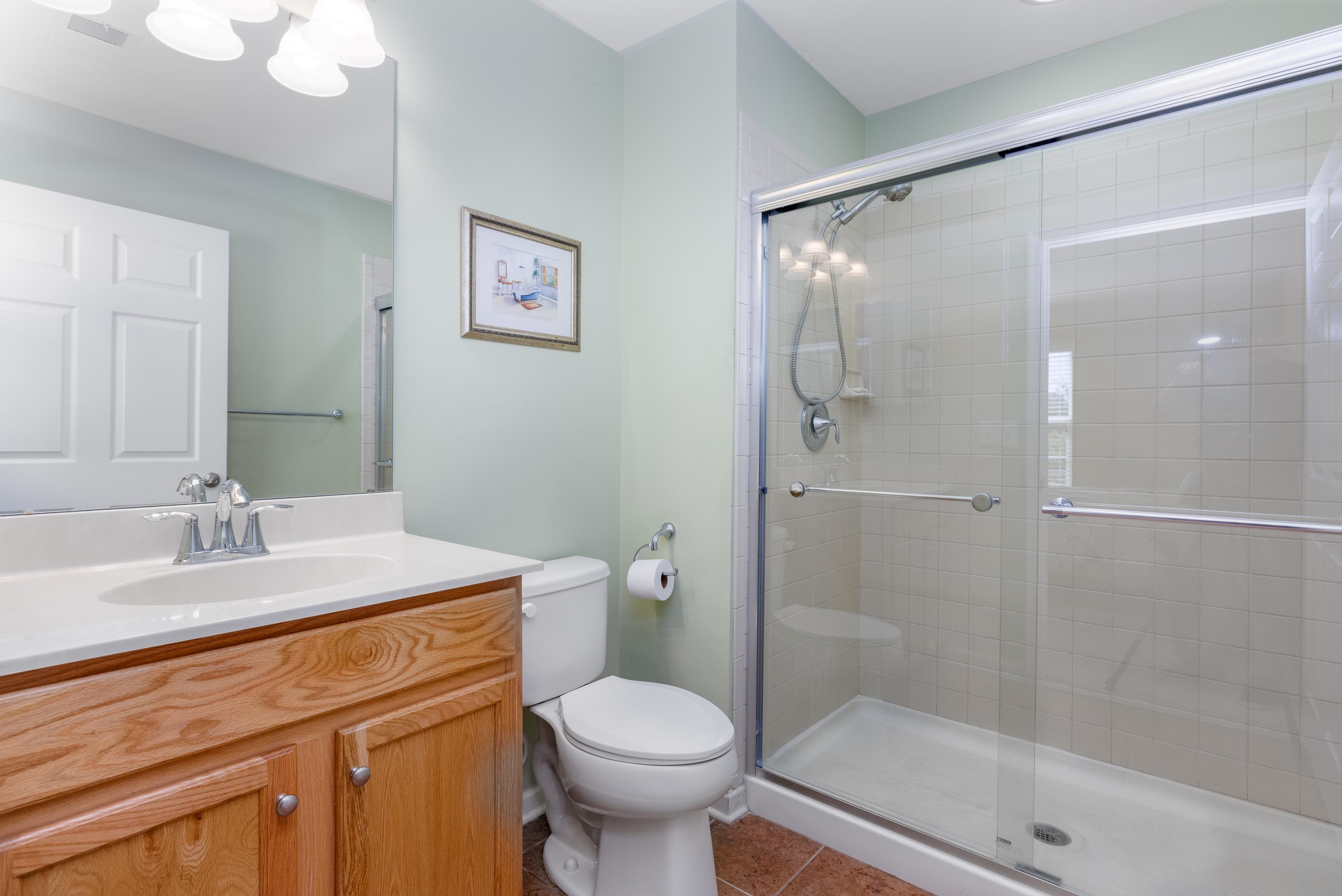 321 Aberdeen Way Rio Grande, NJ 08242 - Photo 20 of 32 a bathroom with a sink toilet and shower