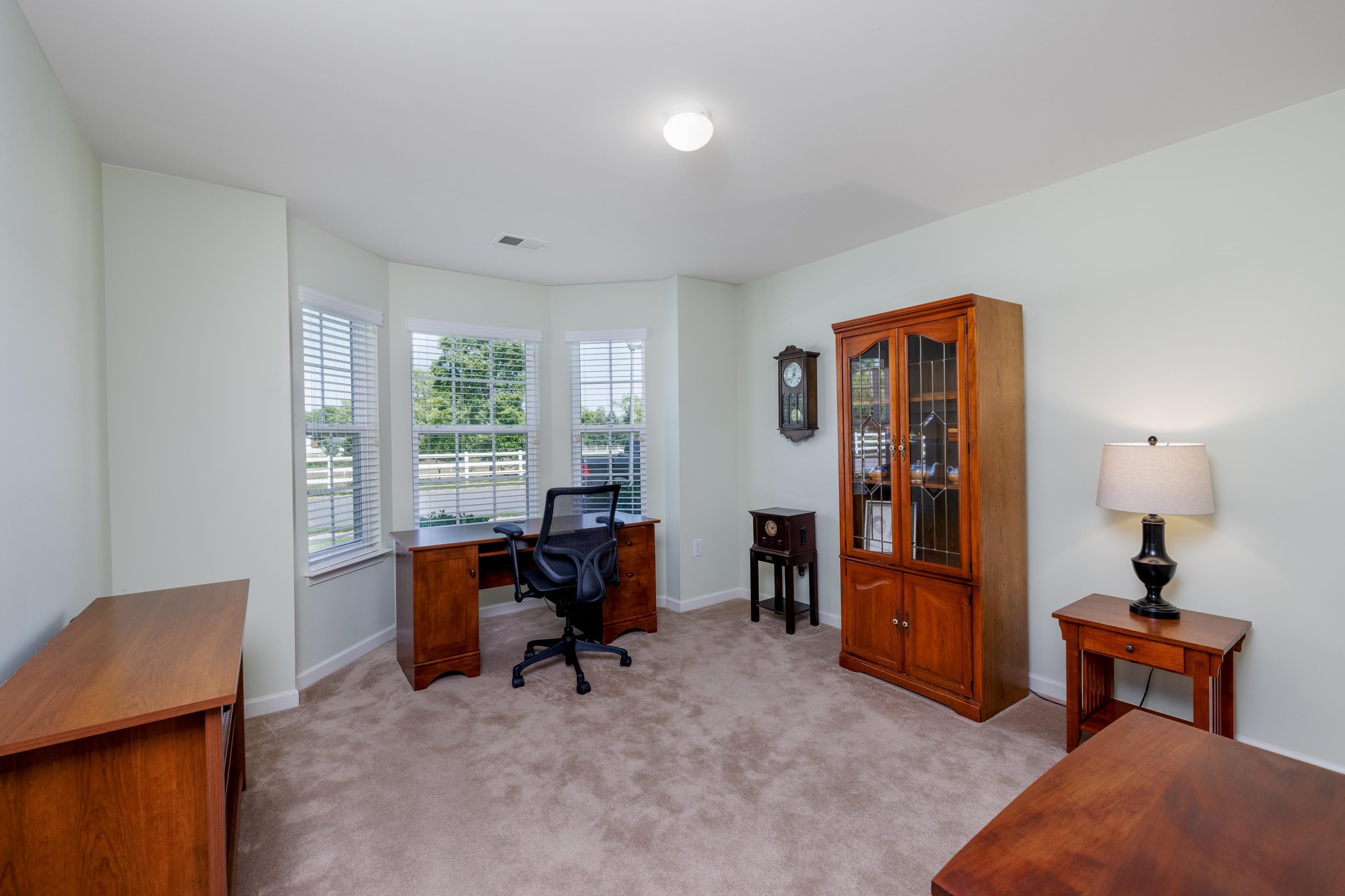 321 Aberdeen Way Rio Grande, NJ 08242 - Photo 21 of 32 a view of a livingroom with workspace and a window