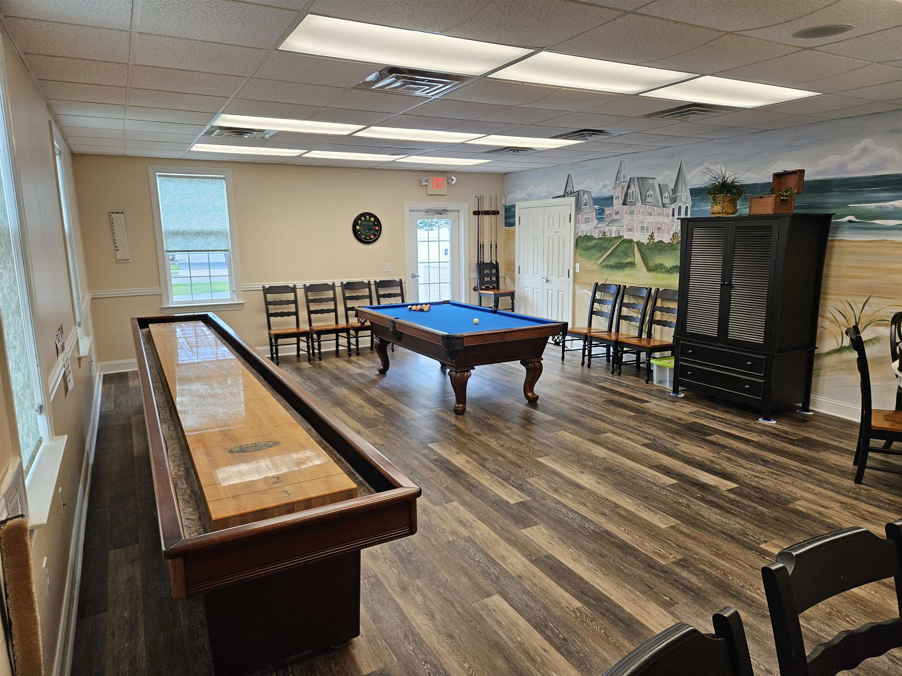321 Aberdeen Way Rio Grande, NJ 08242 - Photo 31 of 32 a living room with furniture pool table and a flat screen tv