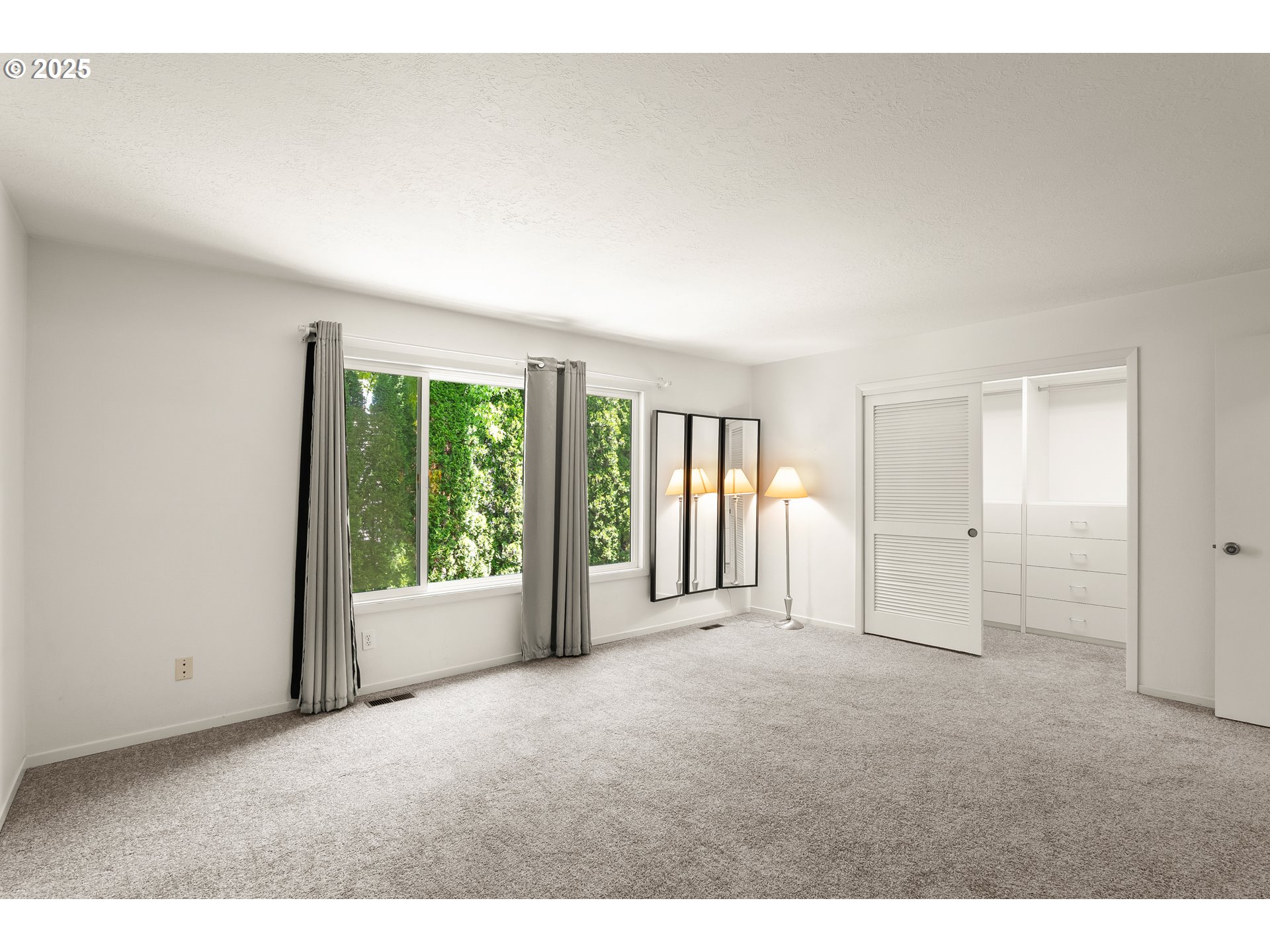 680 Northwest Torryview Lane Portland, OR 97229 - Photo 14 of 18 a view of an empty room with a window