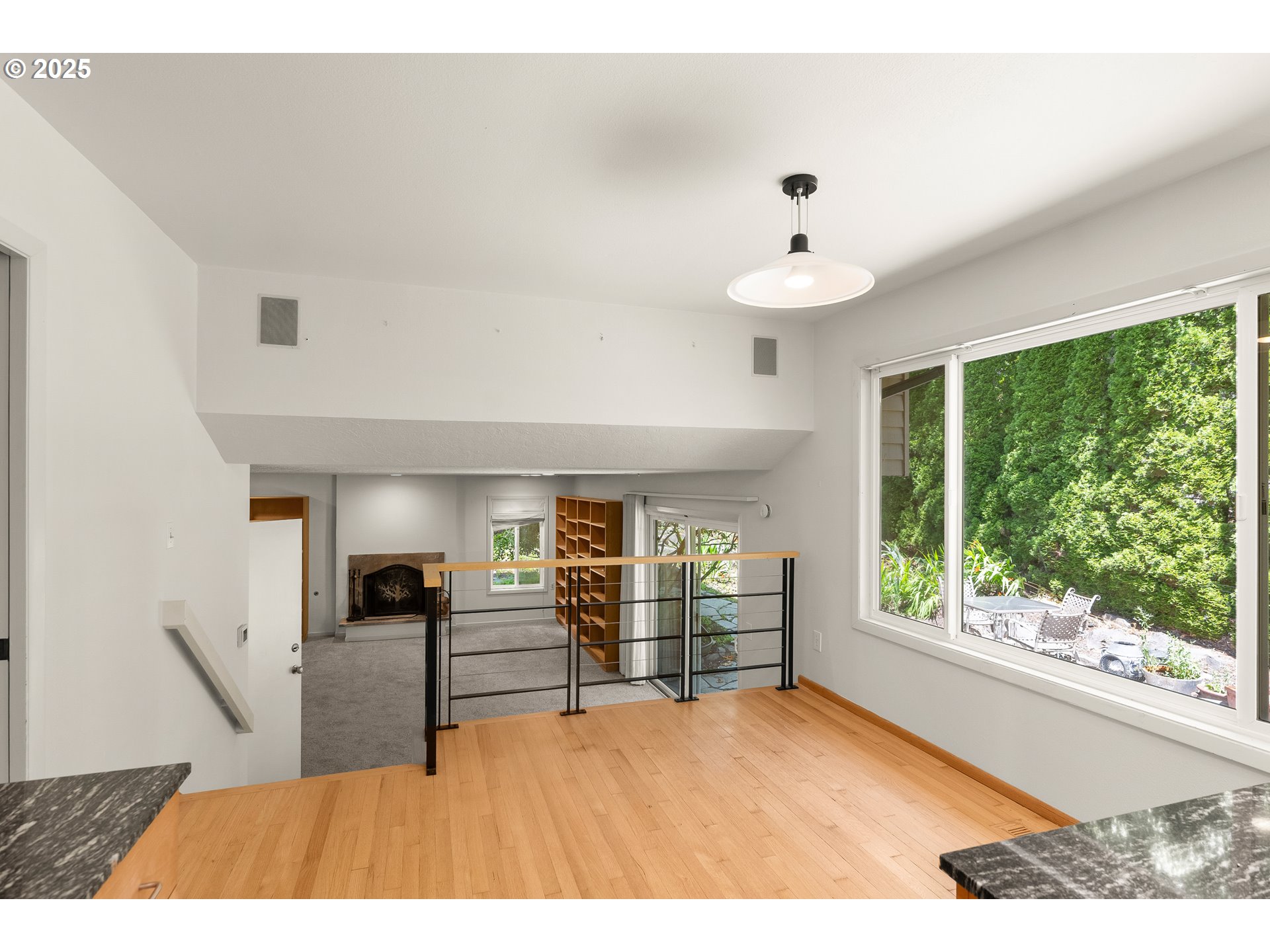 680 Northwest Torryview Lane Portland, OR 97229 - Photo 7 of 18 a living room with furniture and a chandelier