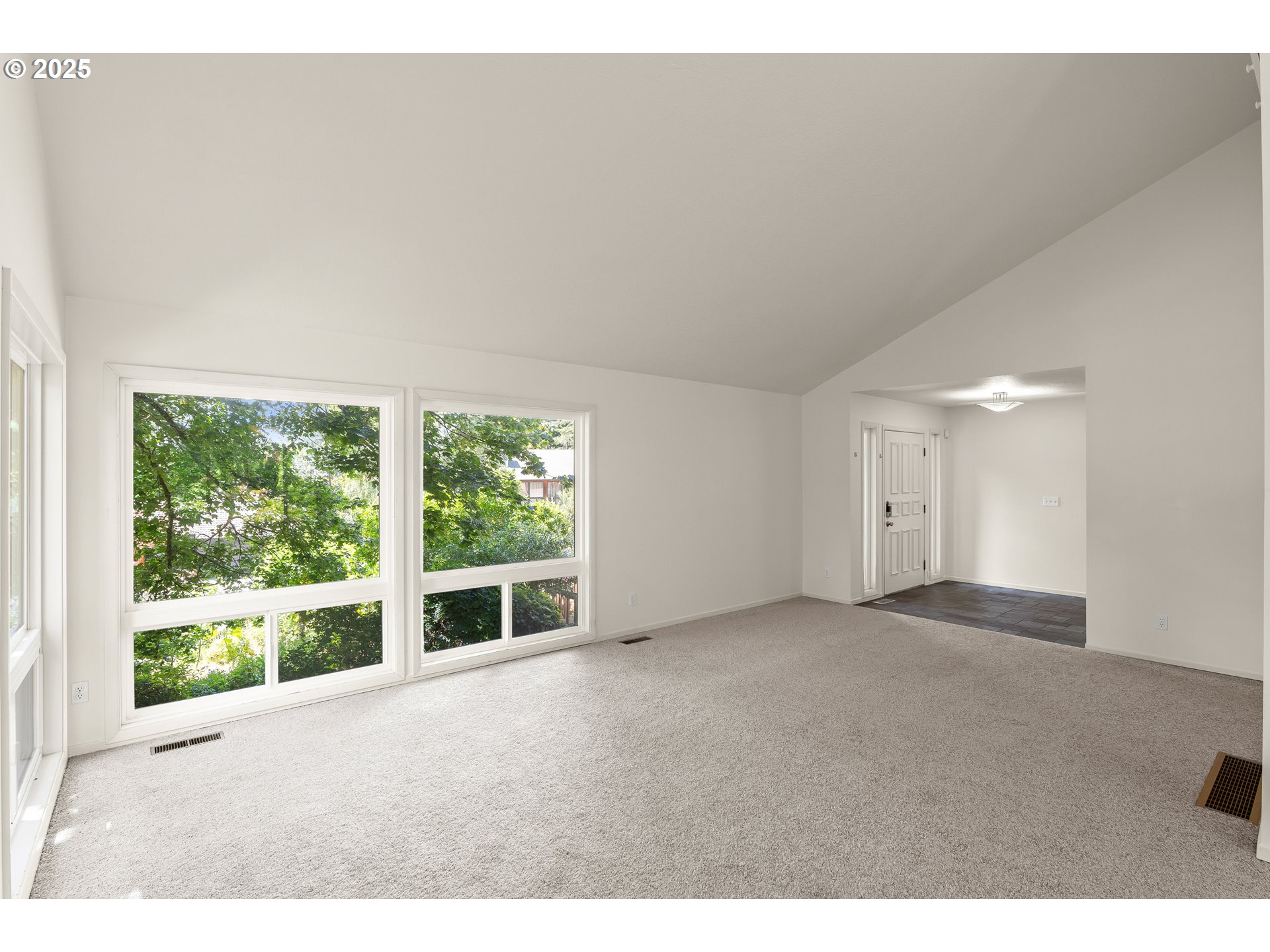 680 Northwest Torryview Lane Portland, OR 97229 - Photo 9 of 18 a view of an empty room with a window