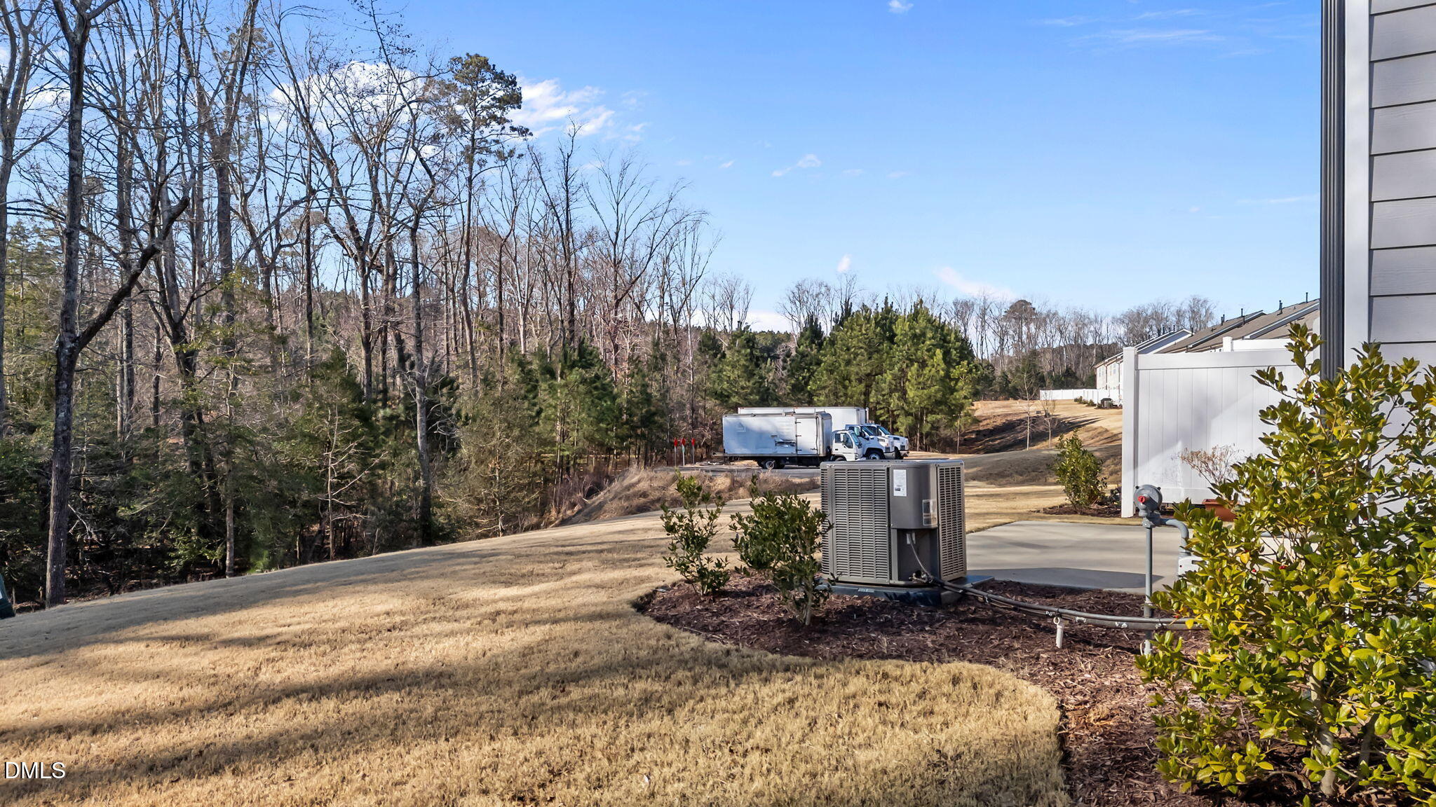 427 Glen Clova Drive Raleigh, NC 27603 - Photo 30 of 42 a view of a garden with sitting area