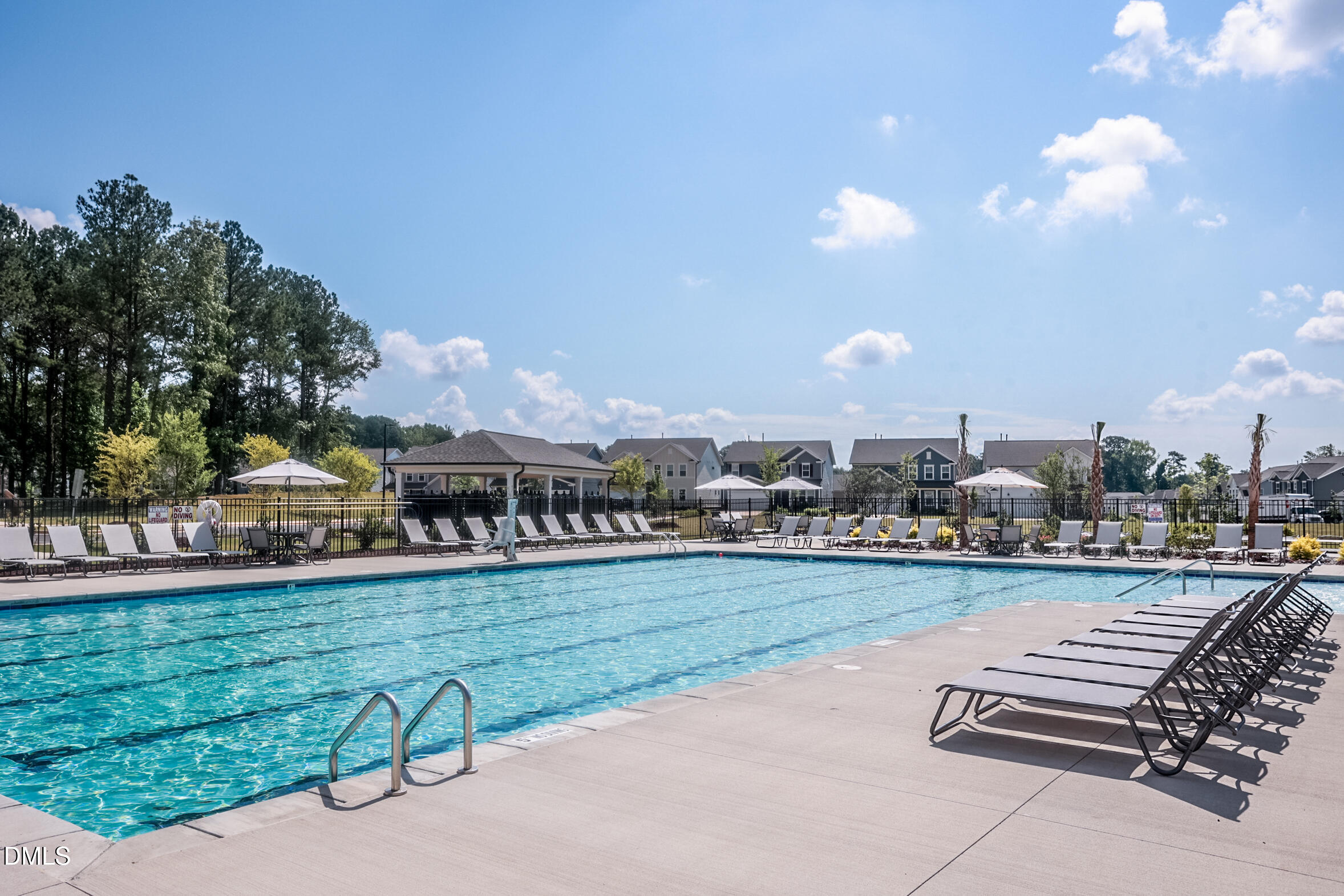 427 Glen Clova Drive Raleigh, NC 27603 - Photo 38 of 42 a view of a swimming pool and a yard